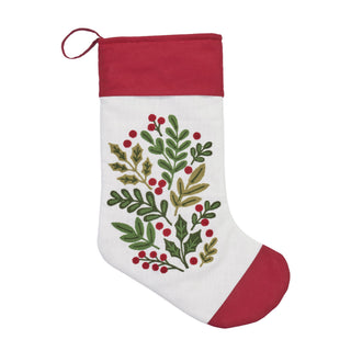 A white Christmas stocking with a red cuff, red toe, and a green and red holly leaf embroidery design in the center.