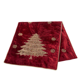 A red velvet table runner featuring a large gold beaded Christmas tree in the center and small gold snowflake motifs, displayed on a clean white background.