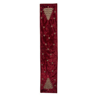 A long, narrow red velvet runner featuring embroidered Christmas tree motifs at the top and bottom, accented with small gold circular details.
