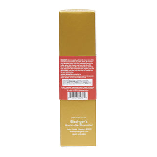 The back of a gold-colored cardboard box for Blissinger's Handcrafted Chocolates, featuring a red label with white text and a barcode.