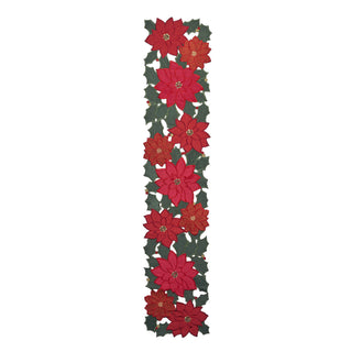 A vertical decorative table runner featuring red poinsettia flowers and dark green holly leaves, shown against a plain white background.