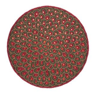 A round hand-beaded placemat with a detailed mandala pattern in red, green, and gold, isolated on a white background.