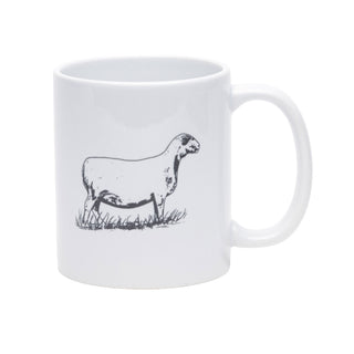 A white ceramic mug featuring a black line art illustration of a sheep standing in grass on the front, set against a plain white background.